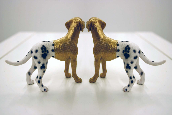 Sectrets and Lies, plastic dogs, gold leaf, 2010